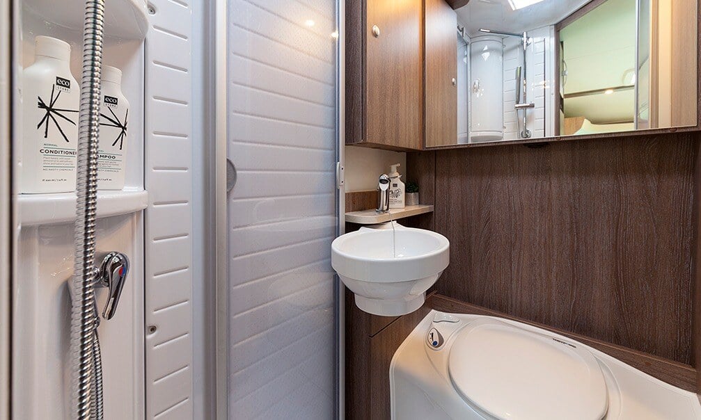 Folding toilet door