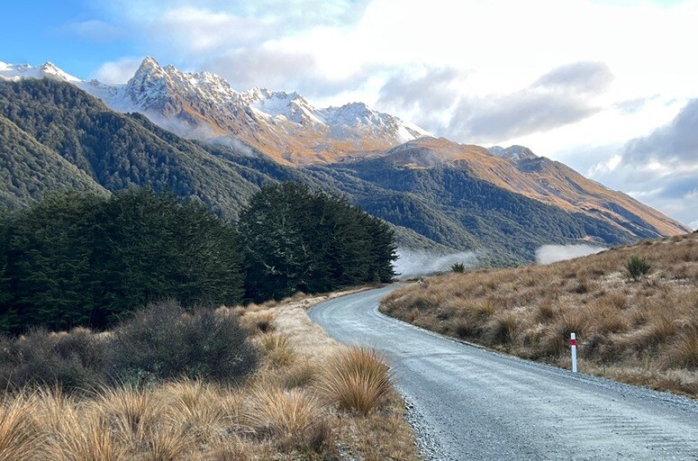 Gravel road leading to the mountains