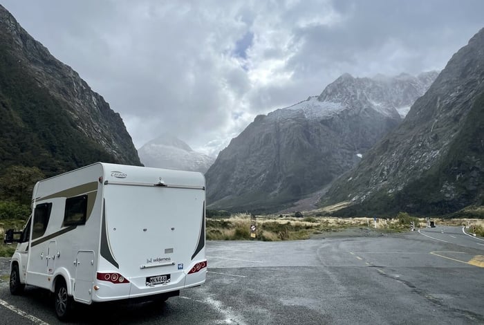 A Wilderness motorhome parked up Milford Sound in the South Island