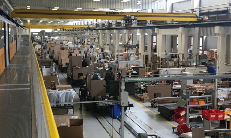 Assembling the interior of a motorhome in a motorhome factory