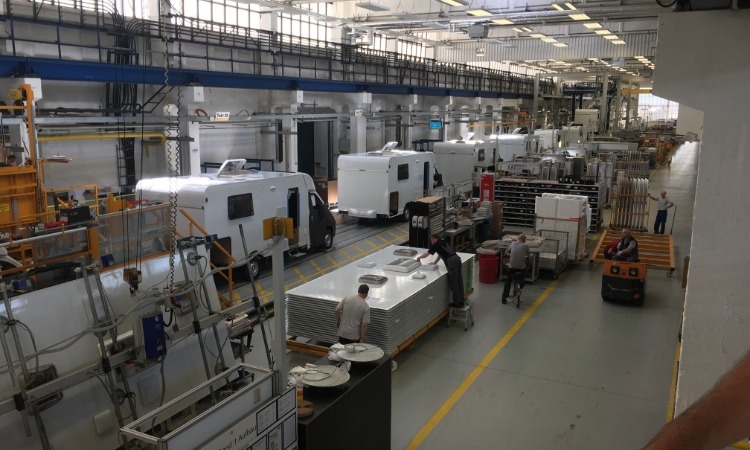 Motorhomes in a factory assembly line