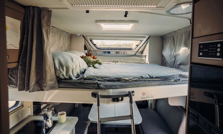 Drop down bed in a Carado motorhome