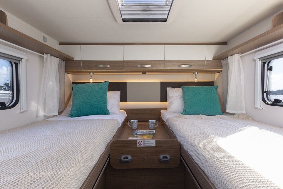 Retreat to the Carado T447’s extra-long twin single beds that also convert into a king