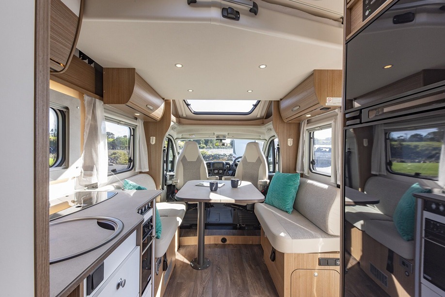 Spread out and relax in the spacious front lounge of the Carado T459