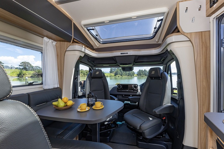 Dine out on the 360 degree adjustable living room table in the HYMER ML-T CrossOver