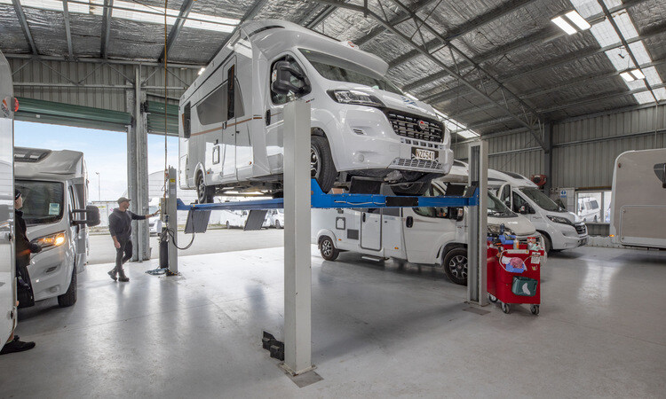 A Bürstner motorhome being assessed in a workshop 