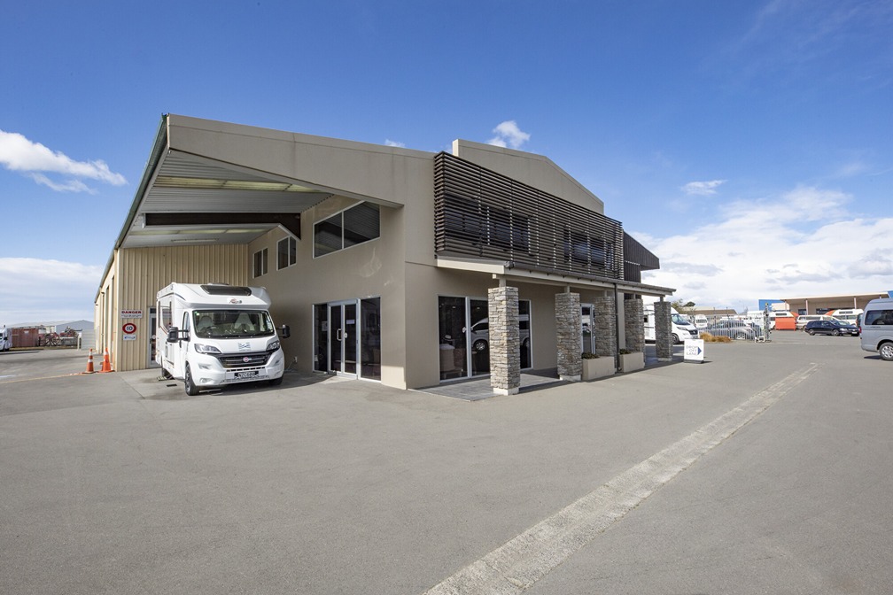 Motorhome parked up under a shade