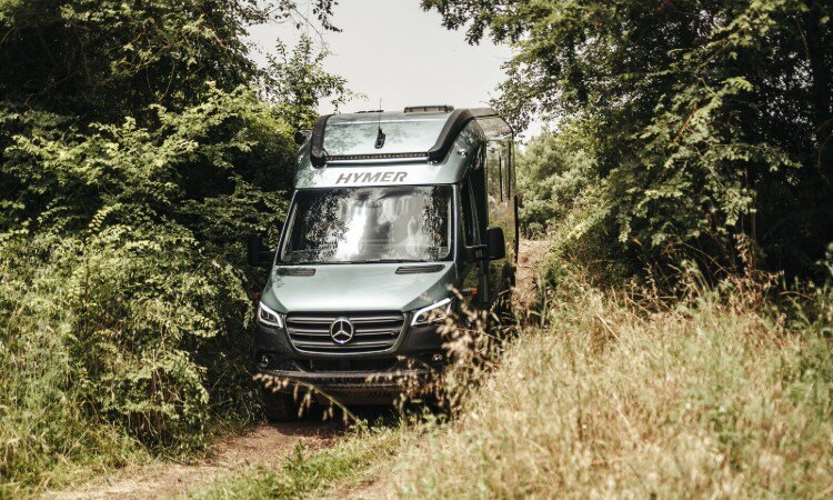 A Mercedes all wheel drive being driven offroad-1
