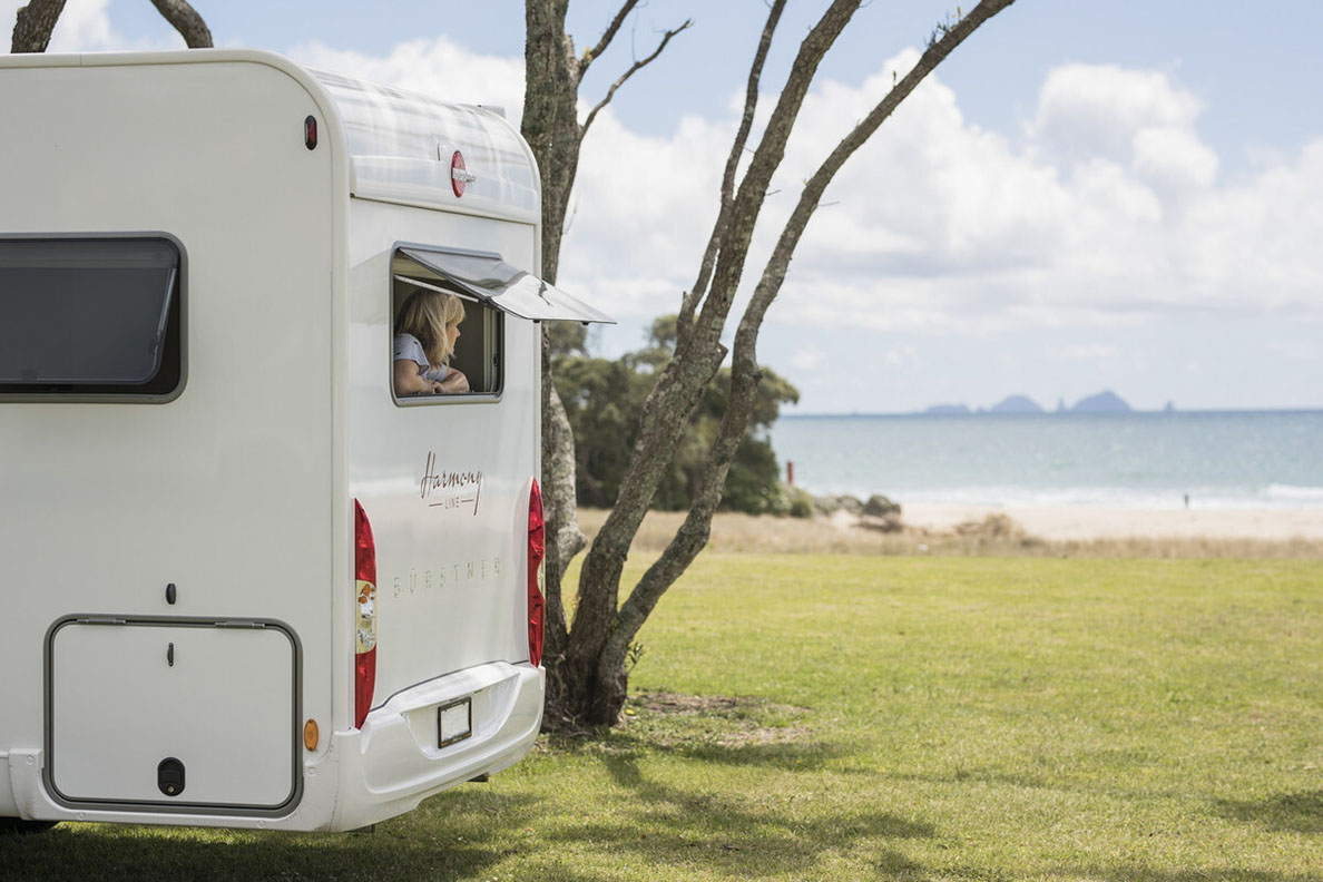 A motorhome owner enjoying fresh air 