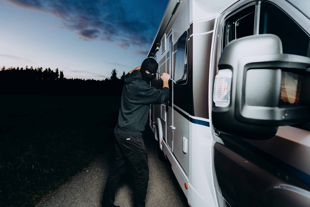 A thief trying to break into a motorhome