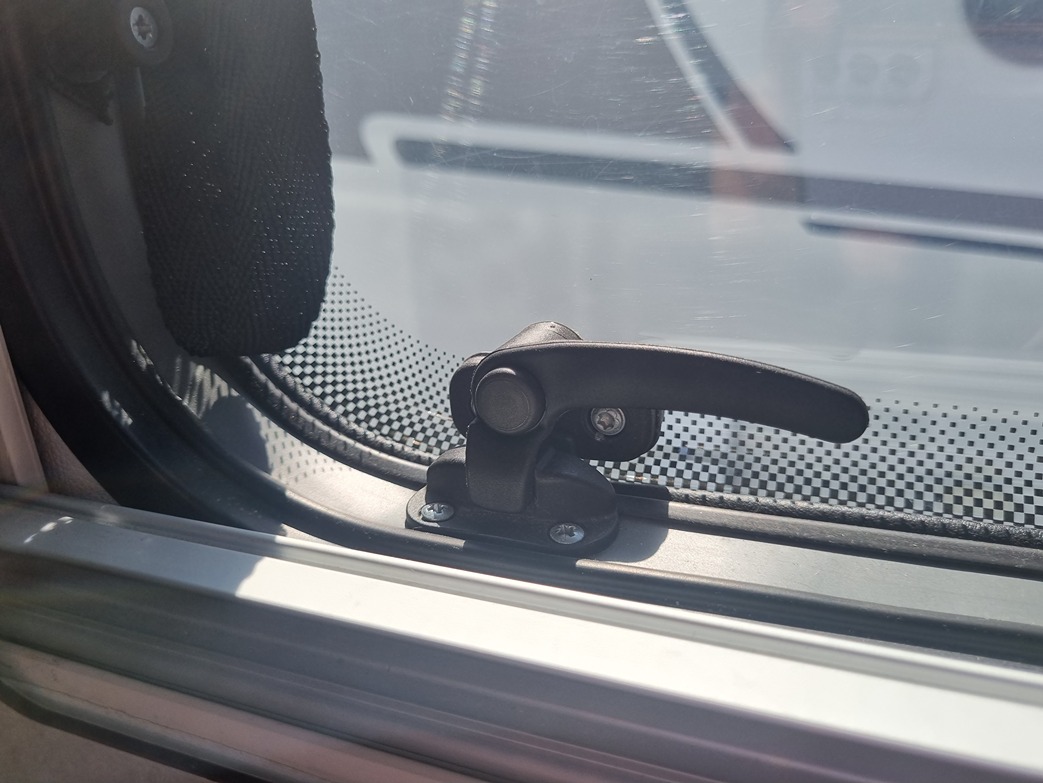 Window lever lock in a motorhome