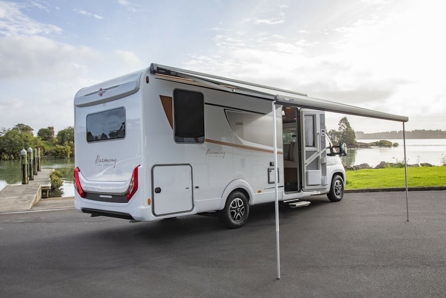 A motorhome with its awning up