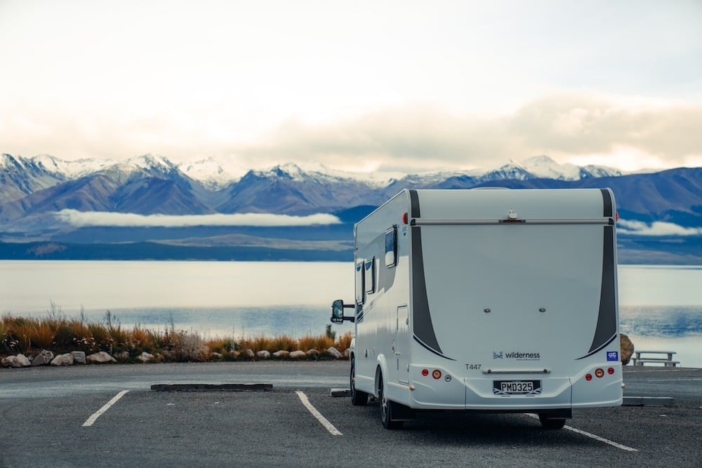 Motorhome parked self-contained at a lake