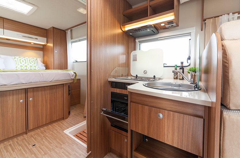 Wilderness 2017 Carado T449 motorhome interior kitchen and bed