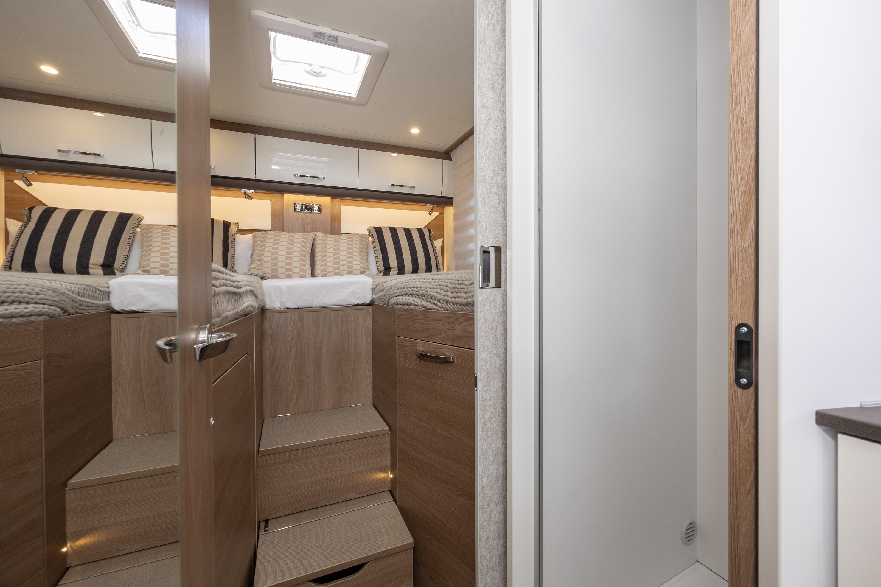 Wilderness 2025 Lyseo TD727 motorhome interior single beds steps