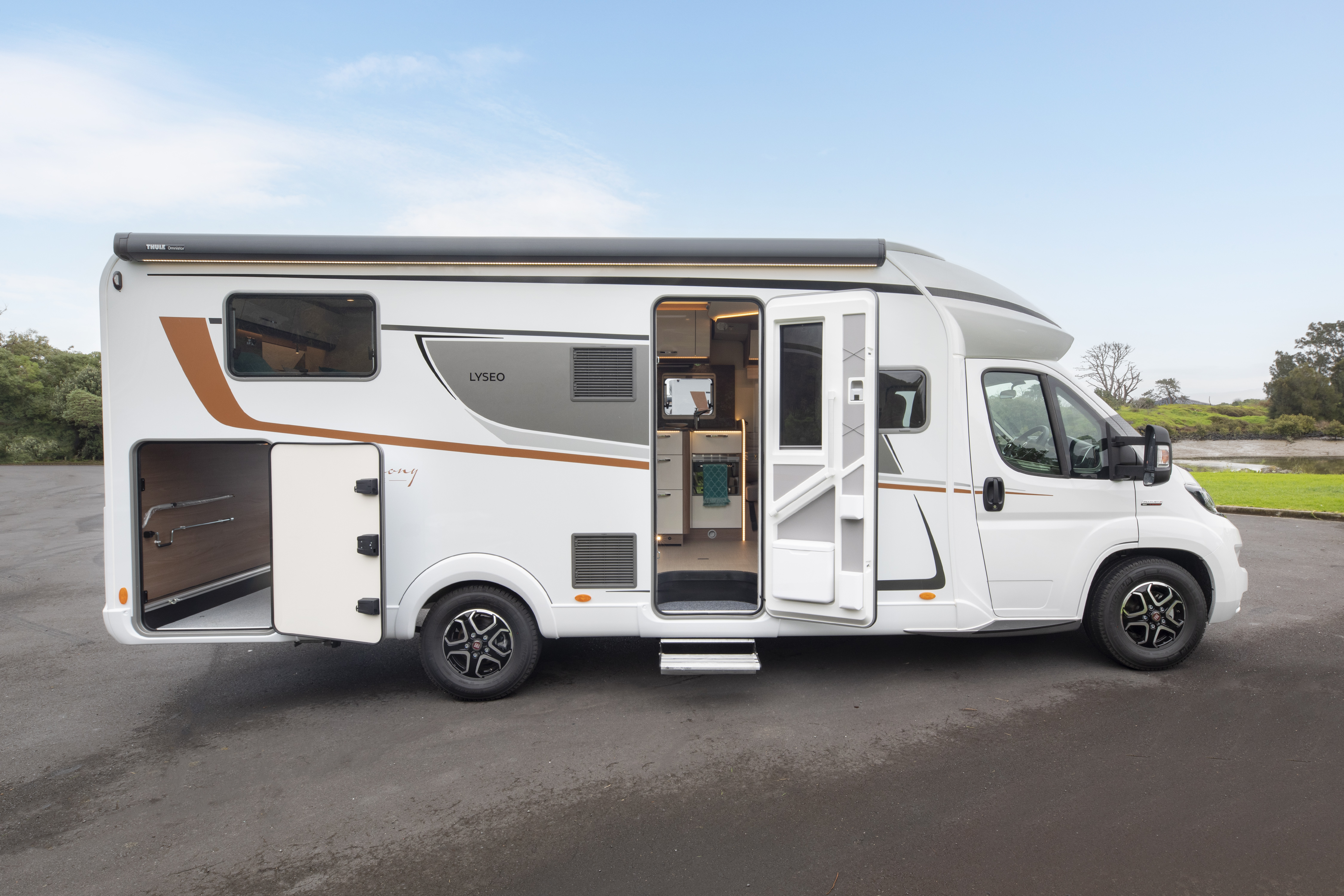 Wilderness 2022 Lyseo TD727 motorhome exterior side view doors open