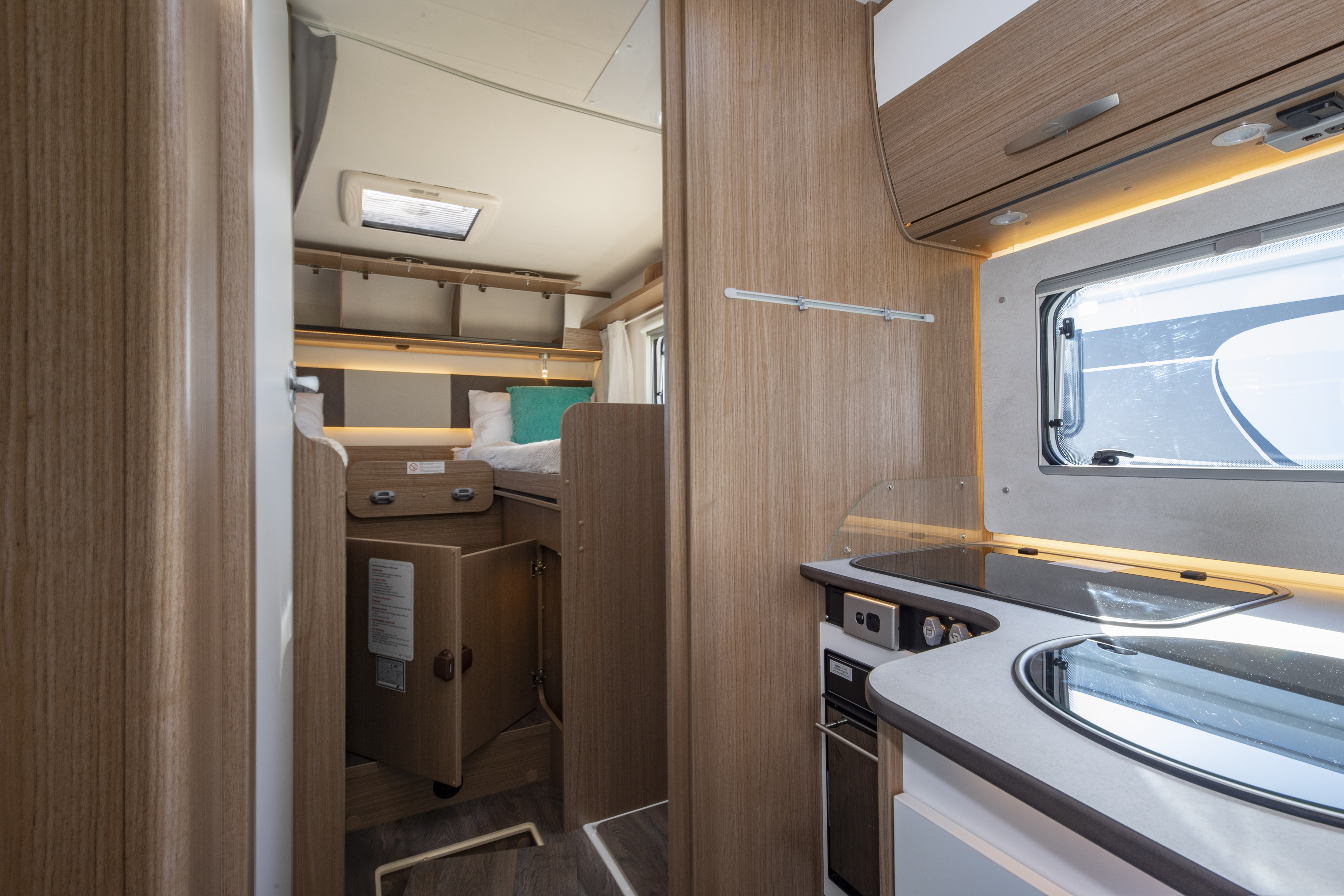 Wilderness 2022 Carado T447 motorhome interior kitchen to bedroom