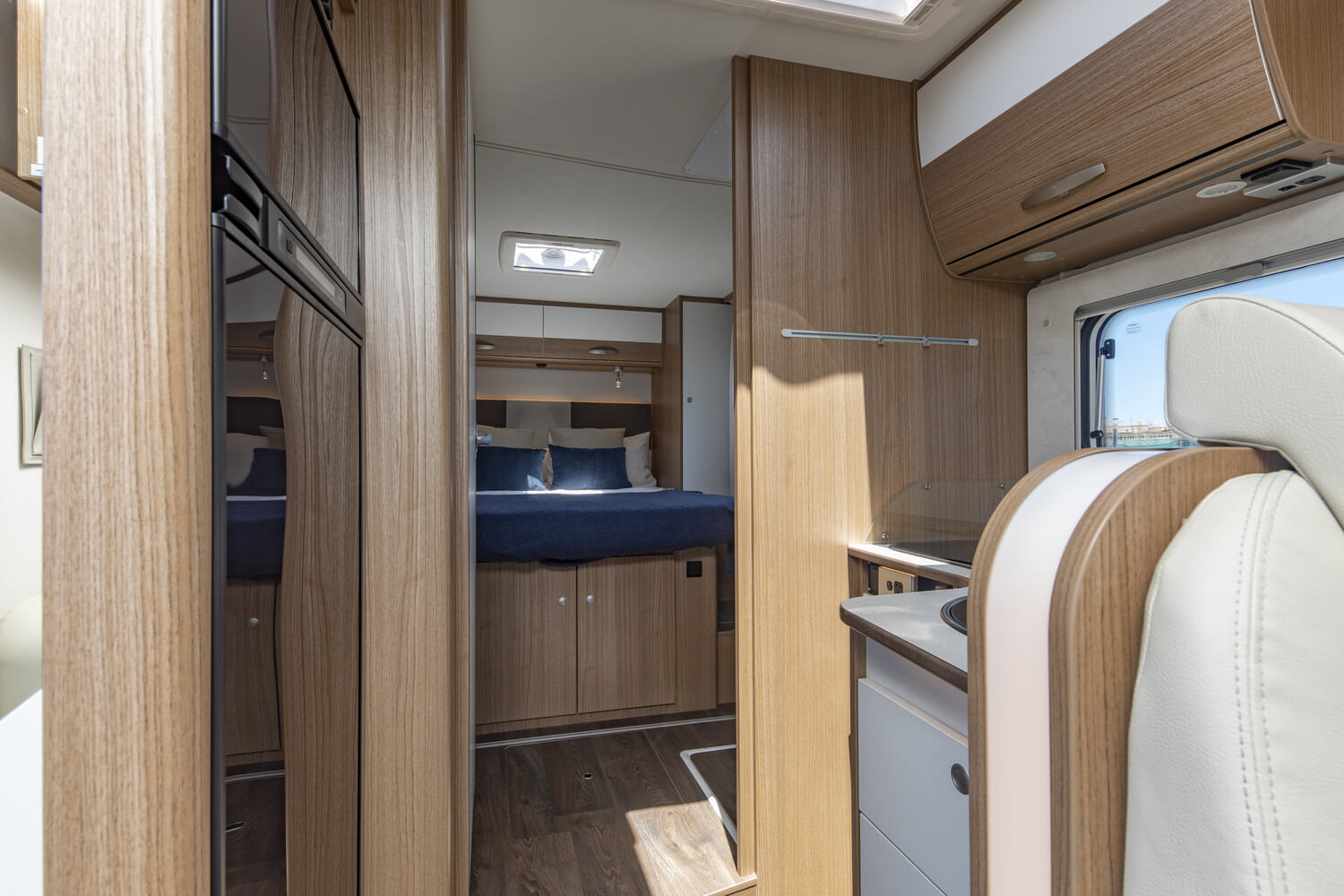 Wilderness 2021 Carado T449 motorhome interior bed and kitchen