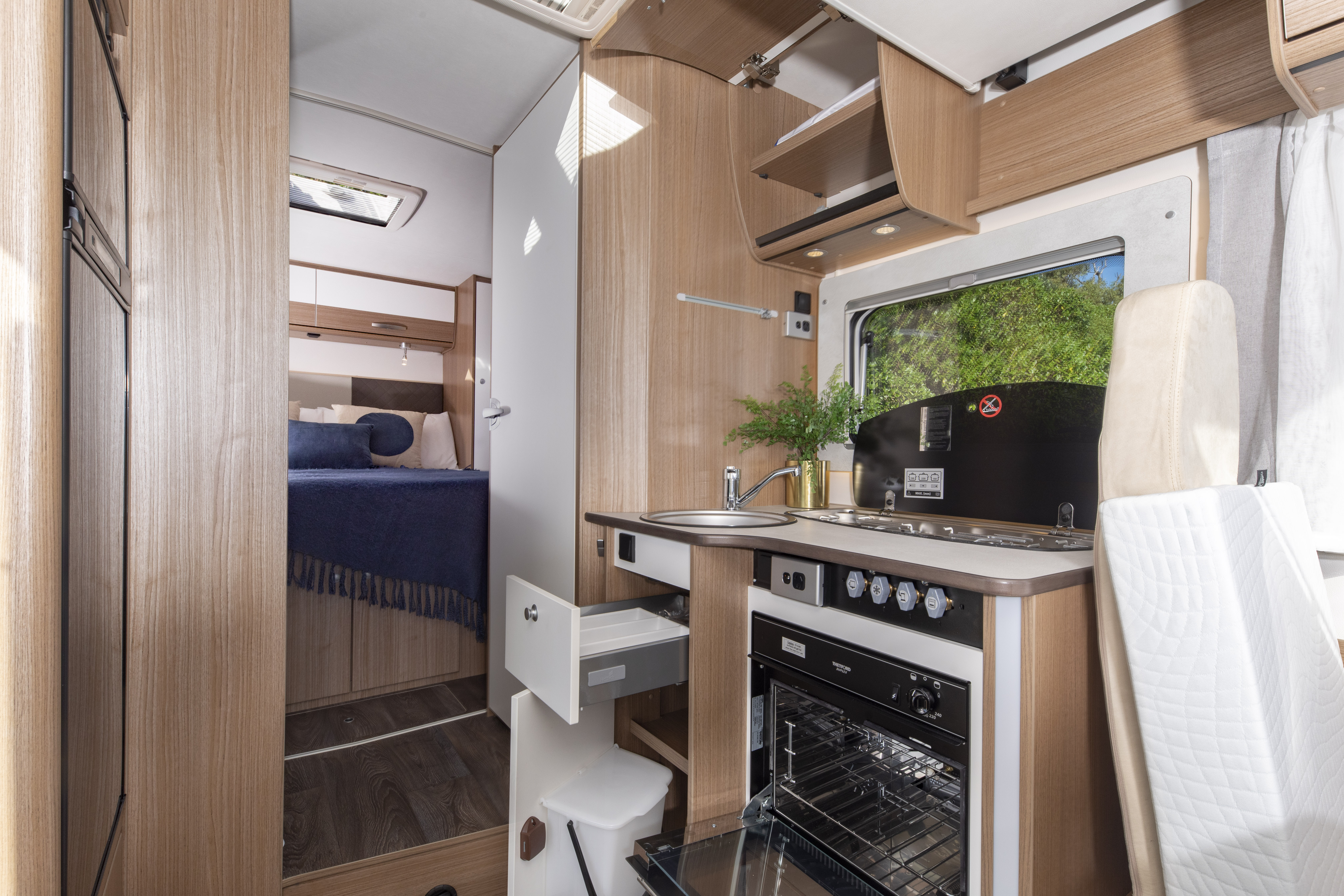 Wilderness 2022 Carado T459 motorhome interior kitchen to bedroom