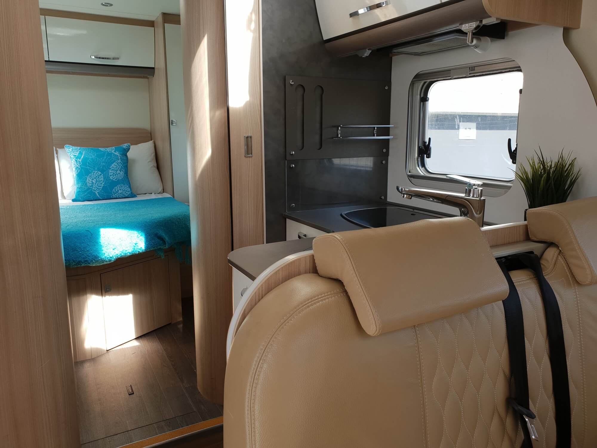 Wilderness 2018 Lyseo IT700 motorhome interior kitchen and bed