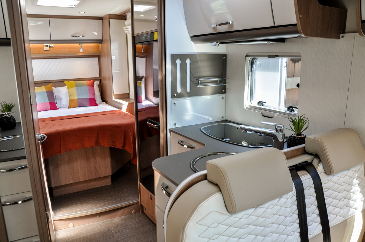 Wilderness 2019 Lyseo T734 motorhome interior kitchen and bed