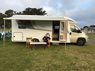 Liz with Tui parked up at a campsite