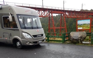 HYMER Starline B680 parked in front of a bridge