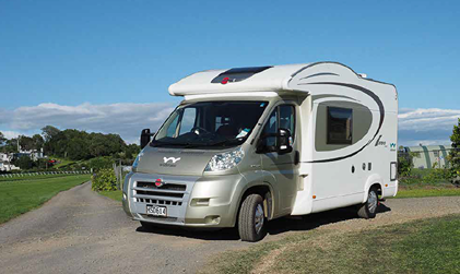 Bürstner Ixeo Time IT586 motorhome parked on a field